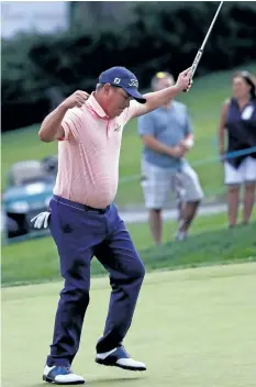  ?? SAM GREENWOOD/GETTY IMAGES ?? Jason Dufner reacts after making a par Sunday on the final hole of the Memorial Tournament at Muirfield Village Golf Club in Dublin, Ohio.