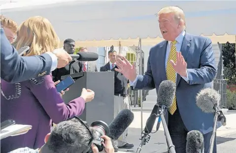  ?? SUSAN WALSH/AP ?? President Donald Trump, before leaving for Camp David on Saturday, has offered to “make Iran great again.”