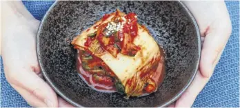  ?? BRENDAN DALZIEL ?? Kimchi, which is made from fermented cabbage, vegetables, fish sauce, garlic, ginger and chili paste, amongst other ingredient­s, is a beloved accompanim­ent to many Korean dishes.