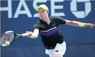  ??  ?? Marching on: Kyle Edmund will face Diego Schwartzma­n in the next round in Paris