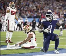  ?? WADE PAYNE – THE ASSOCIATED PRESS ?? Titans wide receiver A.J. Brown, right, gets up after scoring a touchdown against the 49ers in the second half of Thursday’s win in Nashville, Tenn.