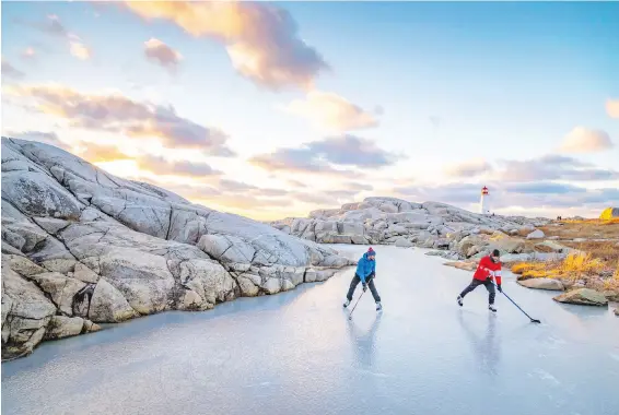  ??  ?? Adam Cornick’s photo of a pick-up hockey game being played on a frozen rock pool at Peggy’s Cove, N.S., as the sun goes down.