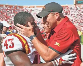  ?? SUE OGROCKI / AP ?? Iowa State coach Matt Campbell, right, celebrates with linebacker Tymar Sutton following their game against Oklahoma in Norman, Okla., on Oct. 7. Iowa State won 38-31. The Cyclones will play Memphis in the 59th AutoZone Liberty Bowl.