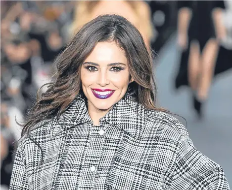  ??  ?? CHERYL has hit the catwalk just six months after welcoming her first child.
The former Girls Aloud star — who gave birth to son Bear in March — strutted her stuff at L’Oreal’s Spring/ Summer 2018 show at Paris Fashion Week.
Cheryl, 34, looked stunning