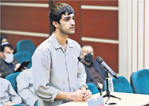  ?? ?? Mohammad Mehdi Karami, a 22-year-old karate champion, was not allowed to choose his lawyer. One was apppointed for him by the regime and Mr Karami was sentenced to death and hanged a few days later