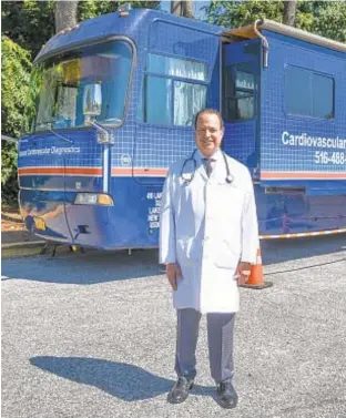  ?? DAVID WEXLER/FOR THE NEW YORK DAILY NEWS ?? Dr. Perry Frankel with his mobile medical van last week.