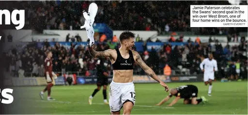  ?? GARETH EVERETT ?? Jamie Paterson celebrates the Swans’ second goal in the win over West Brom, one of four home wins on the bounce.