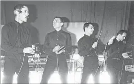  ?? Gie Knaeps Getty Images ?? KRAFTWERK’S Ralf Hütter, left, Florian Schneider, Wolfgang Flür and Karl Bartos during a show in Brussels in 1981, the year “Computer World” was released.