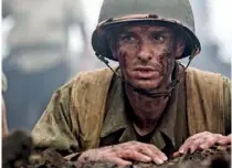  ??  ?? Andrew Garfield dans le rôle de Desmond T. Doss, un infirmier de guerre héroïque.