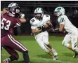  ?? RANDY MEYERS — FOR THE MORNING JOURNAL ?? Columbia running back Marco Cirigliano takes the handoff from quarterbac­k Andrew Champagne and follows a block against Wellington on Oct. 1.