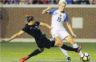  ?? USA TODAY SPORTS ?? Out or reach . . . New Zealand defender Ria Percival (left) tries to shut down United States midfielder Megan Rapinoe in their game at Nippert Stadium, Cincinnati, yesterday. The Football Ferns lost to the world No 1ranked team 50.