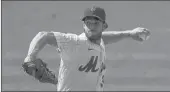  ?? ADAM HUNGER/AP ?? Mets pitcher Steven Matz delivers against the Braves in the first inning Saturday in New York.