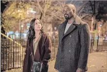  ?? COURTESY OF MARVEL, NETFLIX ?? Rosario Dawson and Mike Colter star in Marvel/Netflix’s “Luke Cage.”