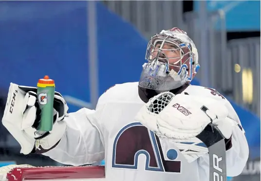  ?? David Zalubowski, The Associated Press ?? Colorado goaltender Philipp Grubauer grabs his water bottle after giving up a goal to Vegas Golden Knights right wing Alex Tuch in the second period Monday night at Ball Arena.