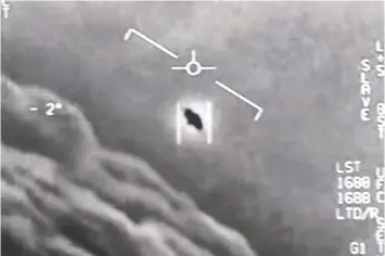  ?? — AFP PHOTO /US DEPARTMENT OF DEFENSE/HANDOUT ?? A file video grab image shows part of an unclassifi­ed video taken by Navy pilots showing interactio­ns with `unidentifi­ed aerial phenomena.'