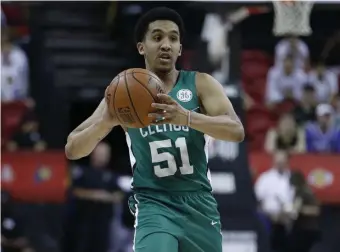  ?? ASSOCIATED PRESS ?? PLAYING IN TRIBUTE: Tremont Waters, shown in summer league action earlier this week, played for the Celtics in yesterday’s loss to the Grizzlies while mourning the death of his father.