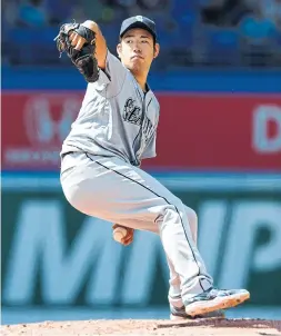  ?? MARK BLINCH GETTY IMAGES ?? While the Blue Jays went the opener route against the Mariners, Yusei Kikuchi went the distance for his first big-league shutout.