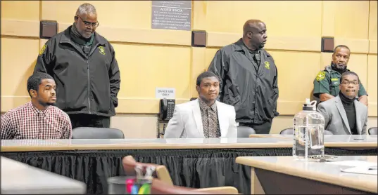  ?? Carline Jean The Associated Press ?? Trayvon Newsome, left, Dedrick Williams and Michael Boatwright were found guilty of first-degree murder of Xxxtentaci­on at the Broward County Courthouse in Fort Lauderdale on Monday. The rapper was killed during a robbery in 2018.