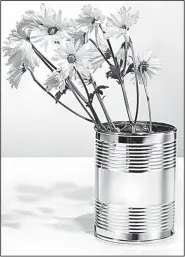  ?? Tiffany ?? Tiffany is selling a line of Everyday Objects including this $1,500 coffee can. Flowers not included.