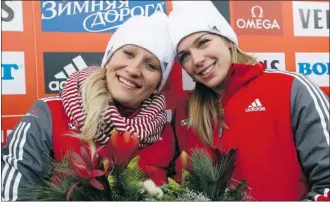  ??  ?? The World Cup bobsled team of Kaillie Humphries and her rookie brakeman Chelsea Valois of Canada posted the winning time of two minutes 3.30 seconds on the La Plagne track in the French Alps Friday.