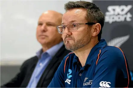  ?? PHOTOSPORT ?? Mike Hesson announces his resignatio­n as Black Caps coach, with New Zealand Cricket chief executive David White alongside him in Auckland yesterday.