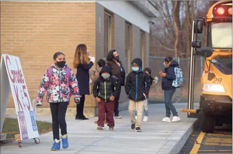  ?? H John Voorhees III / Hearst Connecticu­t Media ?? Danbury students returned to Stadley Rough Elementary School on Tuesday for in-person learning the first time since March.