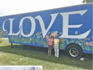  ??  ?? FAR RIGHT | Jane Mullan and Kathy Edwards pose in front of a trailer welcoming visitors to Hearthston­e School. They both agree that love is central to their efforts to treat patients using alternativ­e methods.