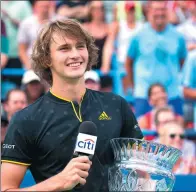  ?? TASOS KATOPODIS / GETTY IMAGES / AFP ?? Alexander Zverev of Germany savors victory after defeating Kevin Anderson of South Africa in Sunday’s Citi Open final in Washington, DC.