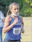  ?? James Franco / Special to TU ?? Shaker’s Leonni Griffin said about the new format, “It’s a lot better than not running.” She finished first Saturday.