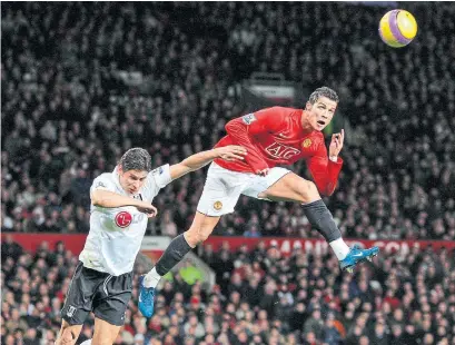  ?? ANDREW YATES AFP VIA GETTY IMAGES ?? Cristiano Ronaldo, right, won three Premier League titles and scored 84 goals while playing with Manchester United.