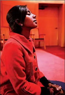  ?? Special to the Democrat-Gazette ?? A young woman meditates in the Arkansas House of Prayer, which is open to all faiths.