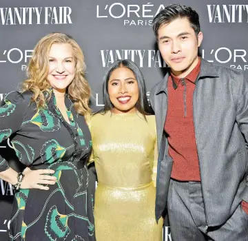  ??  ?? (From left) Vanity Fair Executive West Coast Editor Krista Smith,Yalitza Aparicio, and Henry Golding are seen as Vanity Fair and L’Oréal Paris Celebrate New Hollywood in Los Angeles. — AFP photo