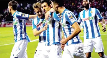  ?? Reuters ?? Real Sociedad’s players celebrate after their victory over Mirandes in King’s Cup match on Wednesday.