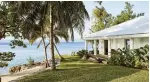  ??  ?? Turquoise water, palm trees fringing the white sand beach and a sense of serenity surround the private Tamarind Beach Estate on Vanuatu.