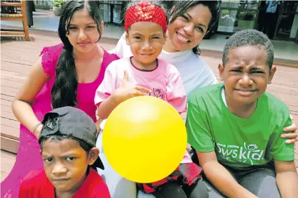  ?? Photo: Nicolette Chambers ?? Laisa Raisamu with four of the WOWS kids from the Lautoka Hospital, from left: Tanya Kumar, Pilu Gopal, Lumina Valeiwaqa and Ilaisa Narowa during the WOWS Kids Fiji family fun day get-together at the Tanoa Waterfront Hotel in Lautoka on October 17, 2020.