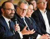  ?? (Photo AFP) ?? Lors d’une réunion du Grand débat dans le Finistère, en présence de Richard Ferrand, le Premier ministre s’est déclaré favorable au fait de demander des contrepart­ies aux bénéficiai­res des aides sociales.