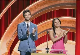  ?? Kevin Winter/Getty Images ?? Jack Quaid, left, and Zazie Beetz applaud during the 96th Oscars nomination­s announceme­nt Tuesday in Beverly Hills, Calif.