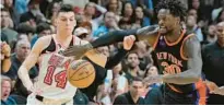  ?? WILFREDO LEE/AP ?? Tyler Herro doesn’t often draw notice for his defense, but the Heat guard came up with this late-game play on Friday night against the Knicks’ Julius Randle that earned immediate respect.