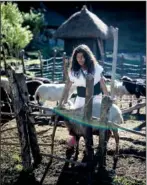  ?? ?? Arhuaco Indigenous teen Irene, 16, helps with the family sheep Jan. 18 in Nabusimake.