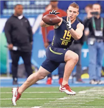  ?? BRIAN SPURLOCK, USA TODAY SPORTS ?? Versatile running back Christian McCaffrey of Stanford has seen his draft stock on the rise.