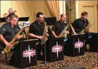  ?? (Democrat-Gazette file photo) ?? Members of the Stardust Big Band perform in a 2019 photo at the Arlington Resort Hotel & Spa in Hot Springs. The band joins area high school jazz bands for the North Little Rock Jazz Festival on Saturday.