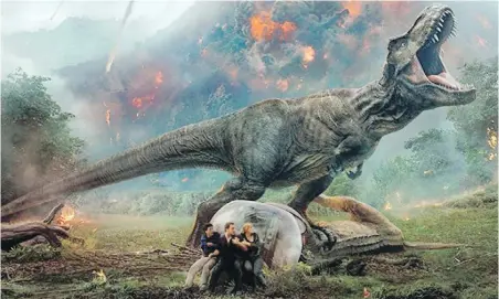  ?? UNIVERSAL PICTURES ?? Poachers and erupting volcanoes threaten the future of the dinosaurs of Jurassic Park: Fallen Kingdom.