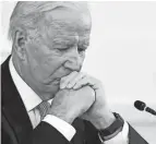  ?? EVAN VUCCI/AP ?? President Joe Biden’s popularity has slumped – with half of Americans now approving and half disapprovi­ng of his leadership, according to a new poll by The Associated PRESS-NORC Center for Public Affairs Research.