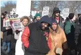  ??  ?? Latrice Hicks and son Jeffrey Williams march Monday to protest the 81-month sentence for Police Officer Jason Van Dyke in the killing of Laquan McDonald.