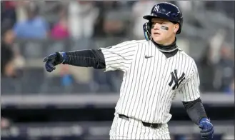  ?? AP photo ?? New York’s Alex Verdugo gestures as he runs the bases after hitting a solo home run during a game against Miami on Tuesday in New York.