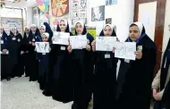  ?? ?? صورة أرشيفية لطالبات مدرسة نشا الإعدادية بنات وهن يرتدين الإسدال