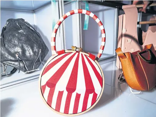  ??  ?? Gizem Yucelen’s winning entry, a circus-tent-inspired red-and-white handbag.