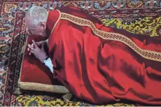  ?? EUROPEAN PRESS AGENCY ?? Pope Francis prostrates himself in prayer during a Good Friday service in St. Peter’s Basilica. The 80-year-old pope lay for several minutes before the central altar as Christians around the world marked the Holy Week.