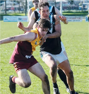 ??  ?? Promoted from the Drouin fourths side to the seniors several weeks ago Tom Evans has more than earned his place, and on Saturday against Wonthaggi beats opponent Kane McCarthy to front position in the chase for the ball.