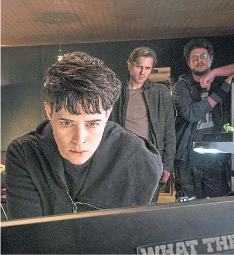  ??  ?? Claire Foy as Lisbeth Salander battling a high-tech enemy in The Girl in the Spider’s Web.